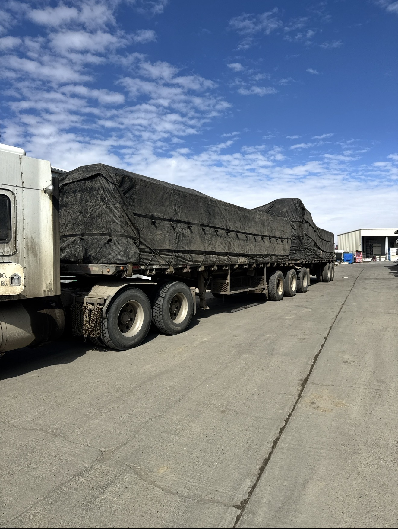 Super B-train tarped for weather-protected haul